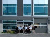 Tim Smith, PTNA Vice President Operations (far left) welcomes his colleagues for the 2012 PTNA Sales Meeting at the new Sales and Technical Center in Ancaster (Canada).